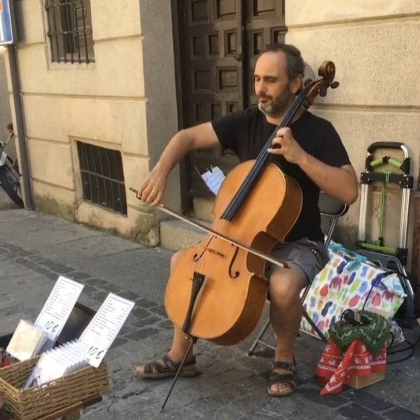 Man playing cello outdoors